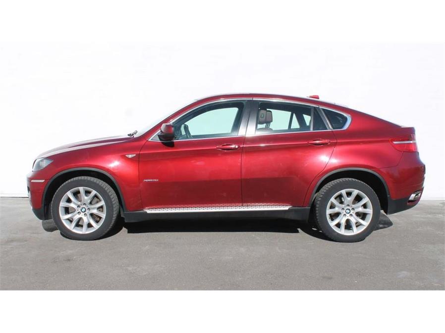 BMW X6 M 4.4 AT (555 л.с.) 4WD