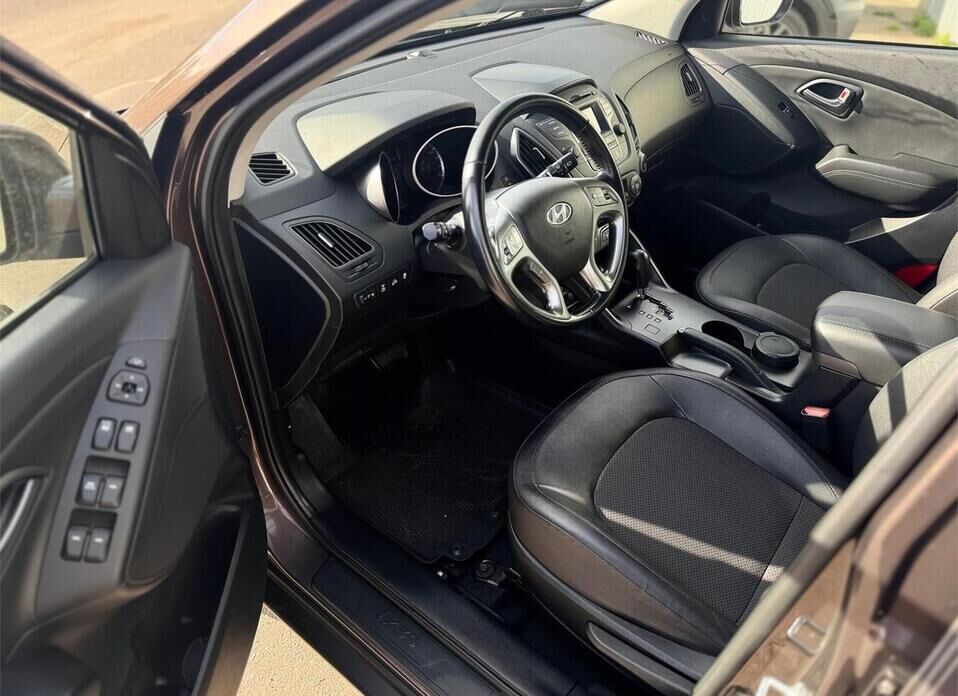 Hyundai ix35, I Рестайлинг 2.0 AT (150 л.с.) 4WD
