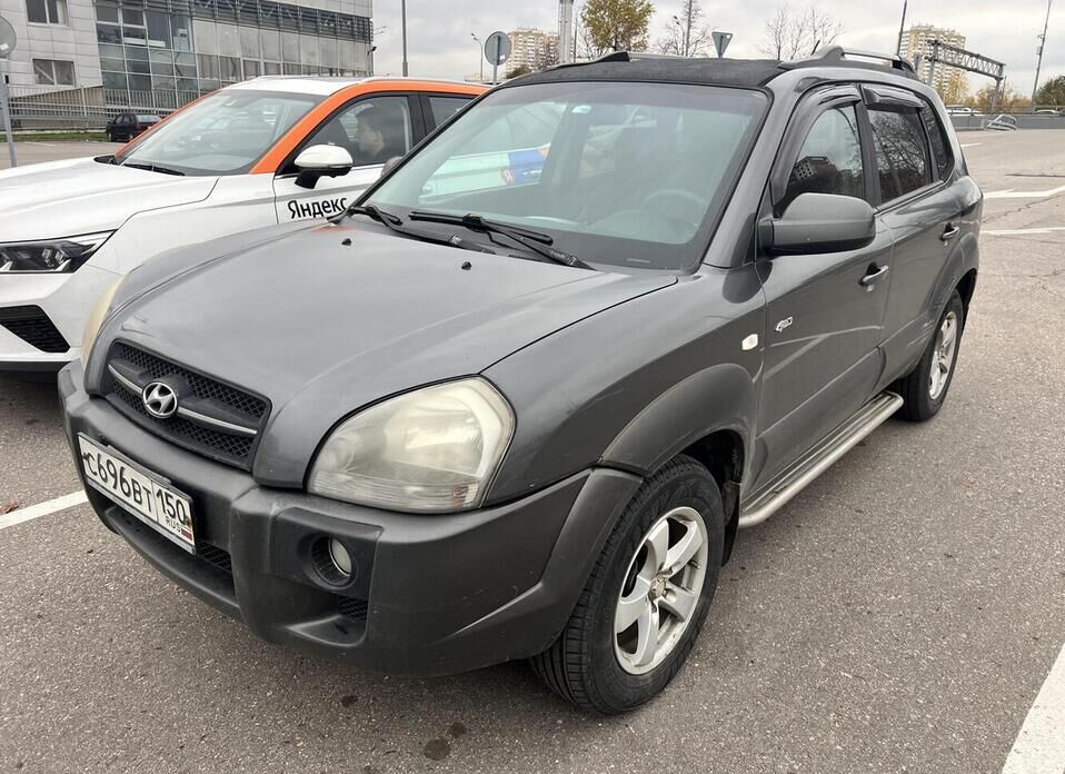 Hyundai Tucson, I 2.0 AT (140 л.с.) 4WD