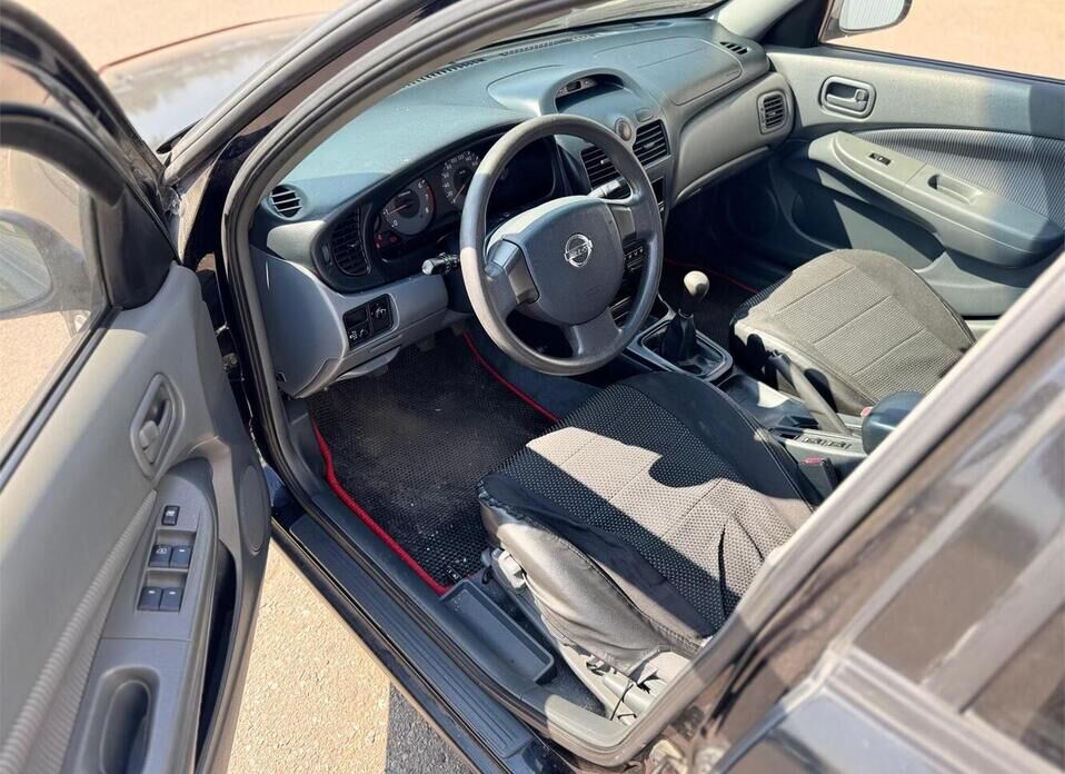 Nissan Almera Classic 1.6 MT (107 л.с.)