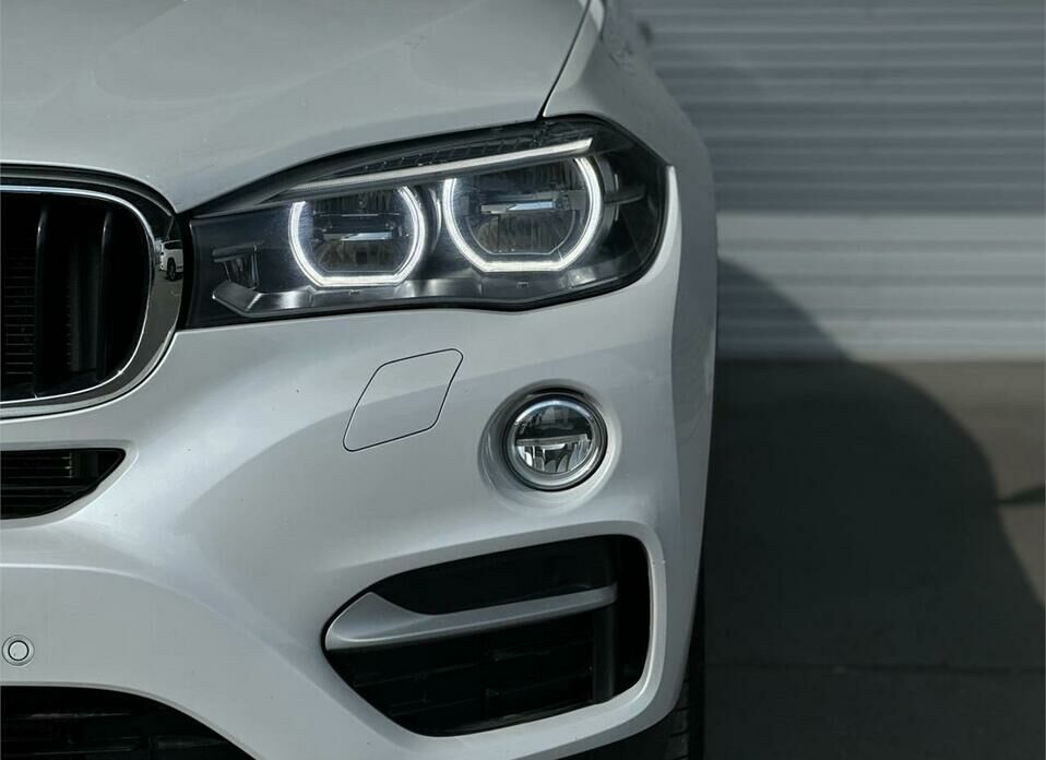 BMW X6 M 4.4 AT (575 л.с.) 4WD