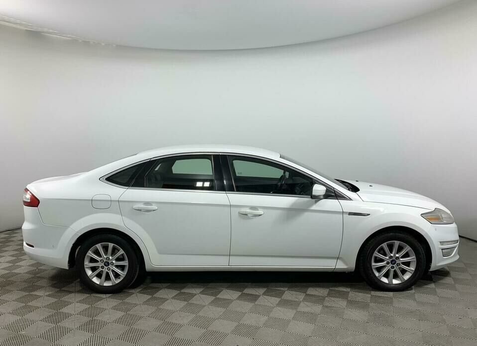 Ford Mondeo 2.0d AT (140 л.с.)