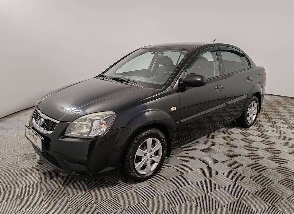 Kia Rio, II Рестайлинг 1.4 AT (95 л.с.)