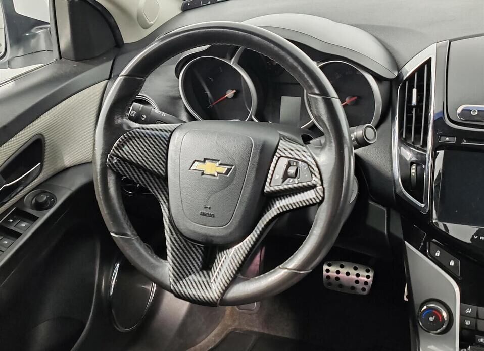 Chevrolet Cruze, I Рестайлинг 1.6 AT (109 л.с.)