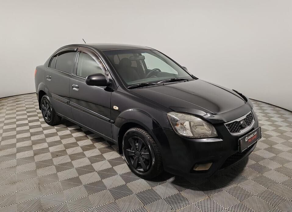 Kia Rio, II Рестайлинг 1.4 MT (97 л.с.)