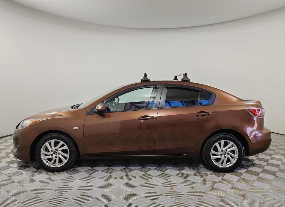 Mazda 3, II (BL) Рестайлинг 1.6 AT (105 л.с.)