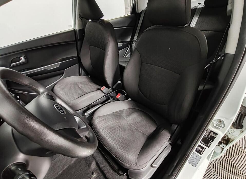 Kia Rio, III 1.4 AT (107 л.с.)