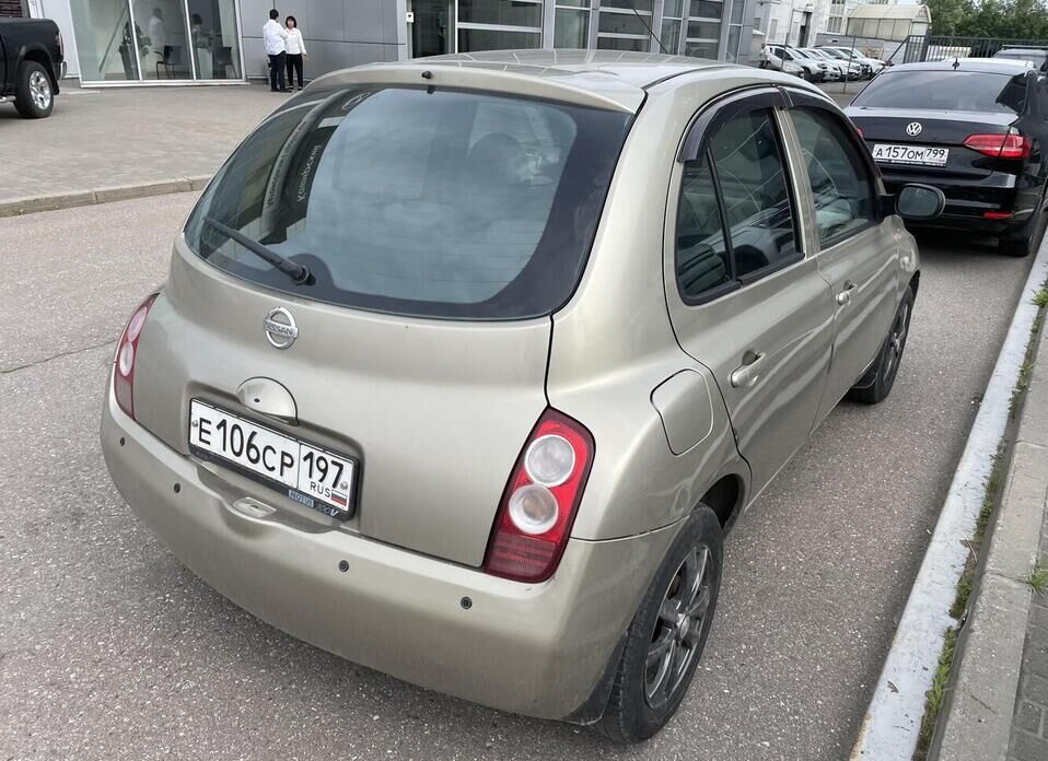 Nissan Micra 1.4 AT (88 л.с.)