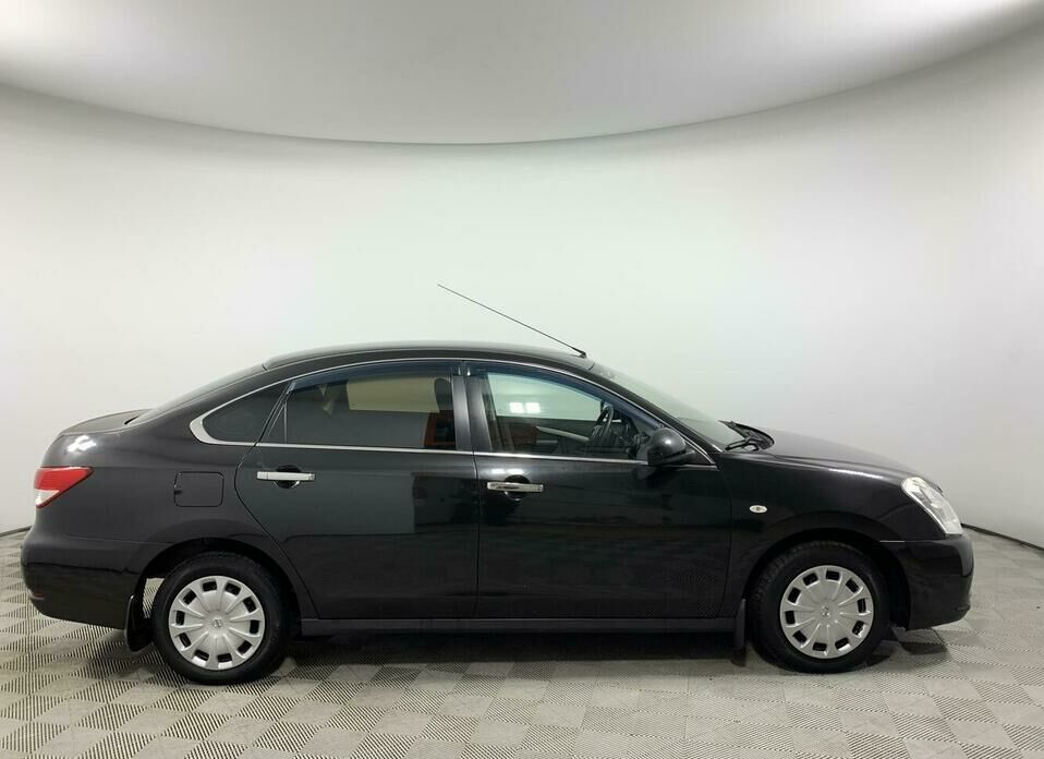 Nissan Almera 1.6 AT (102 л.с.)