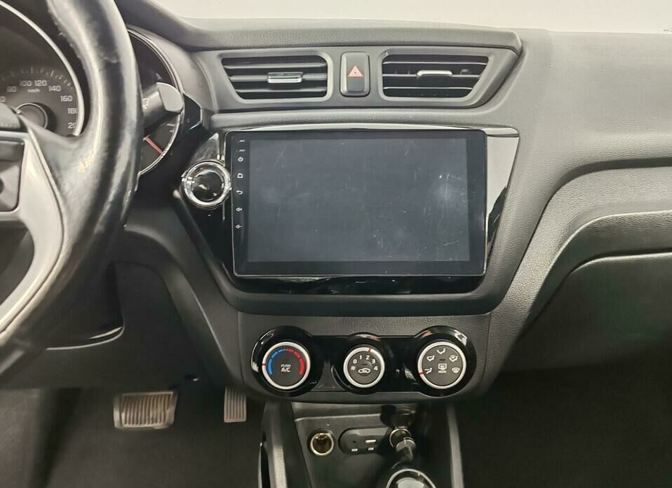 Kia Rio 1.6 AT (123 л.с.)