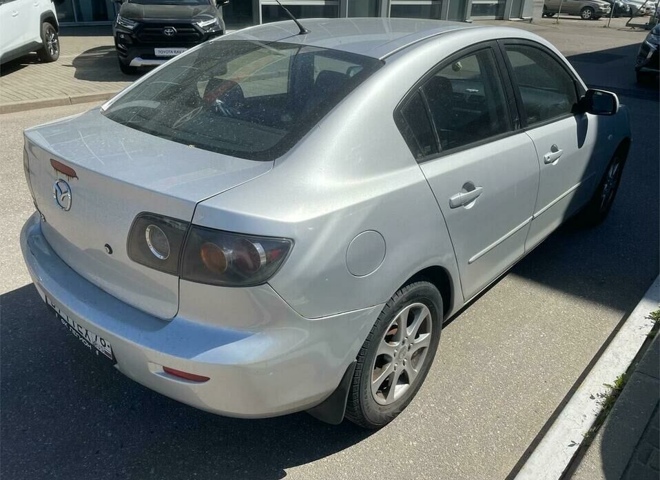 Mazda 3 1.6 AT (105 л.с.)