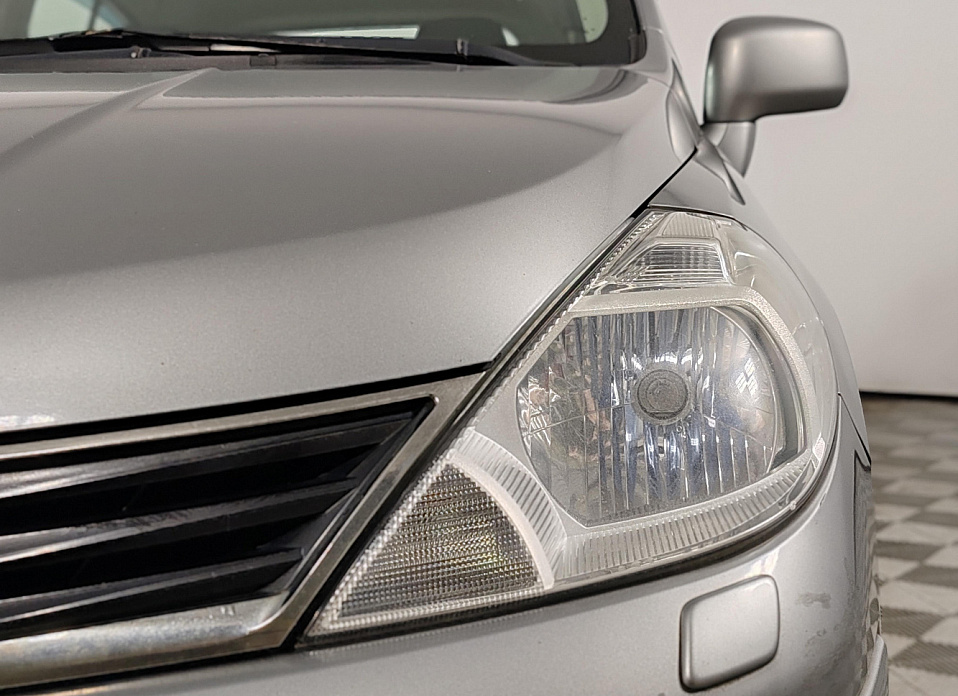 Nissan Tiida, I Рестайлинг 1.6 AT (110 л.с.)