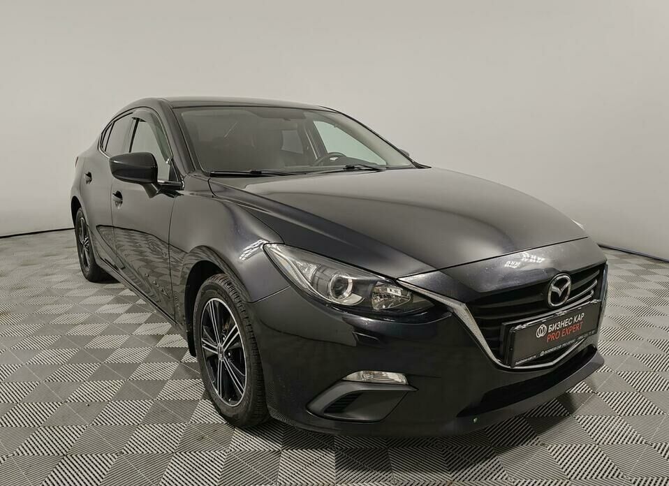 Mazda 3 1.6 AT (104 л.с.)