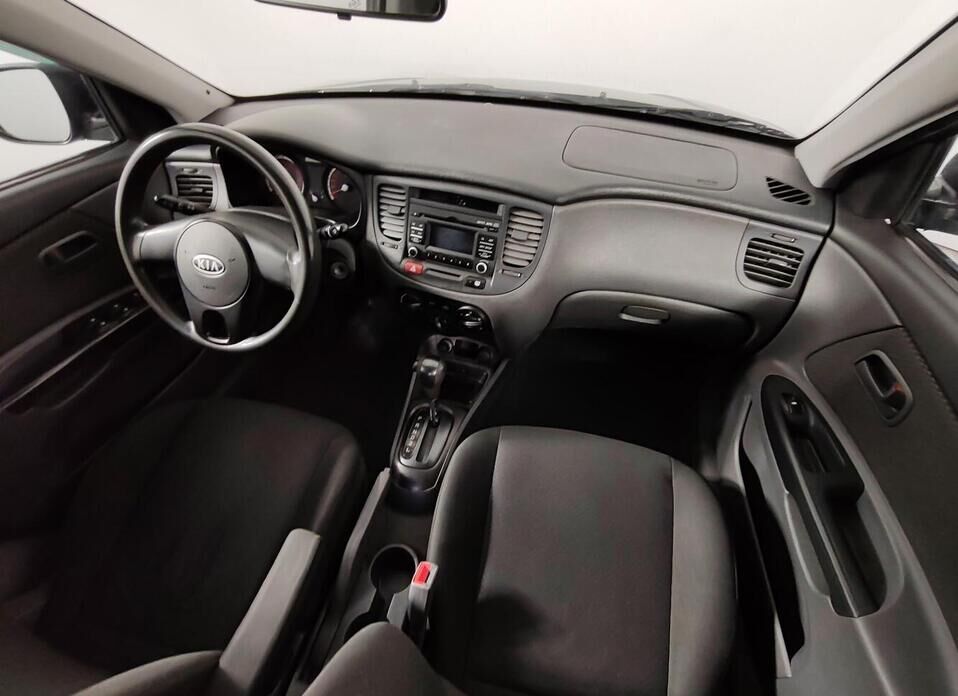 Kia Rio, II Рестайлинг 1.4 AT (95 л.с.)
