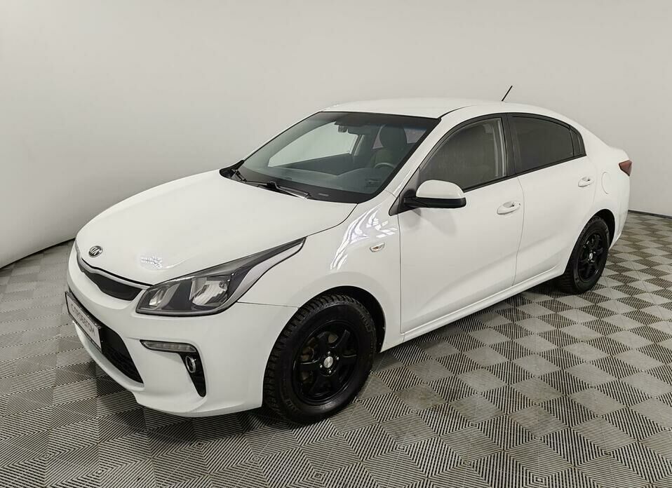 Kia Rio 1.6 AT (123 л.с.)