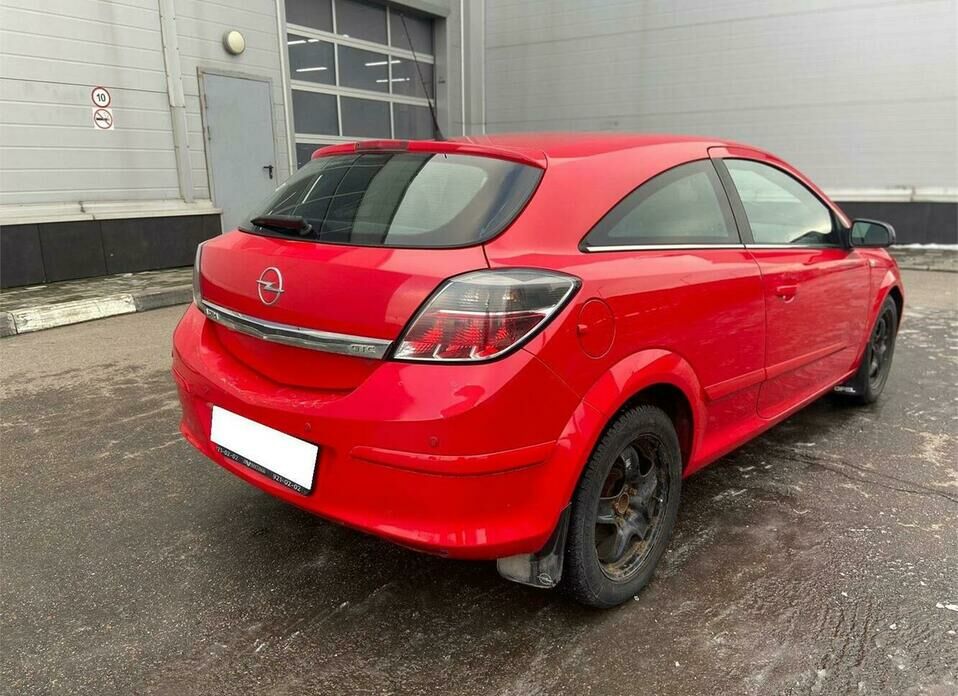 Opel Astra GTC 1.8 AT (140 л.с.)