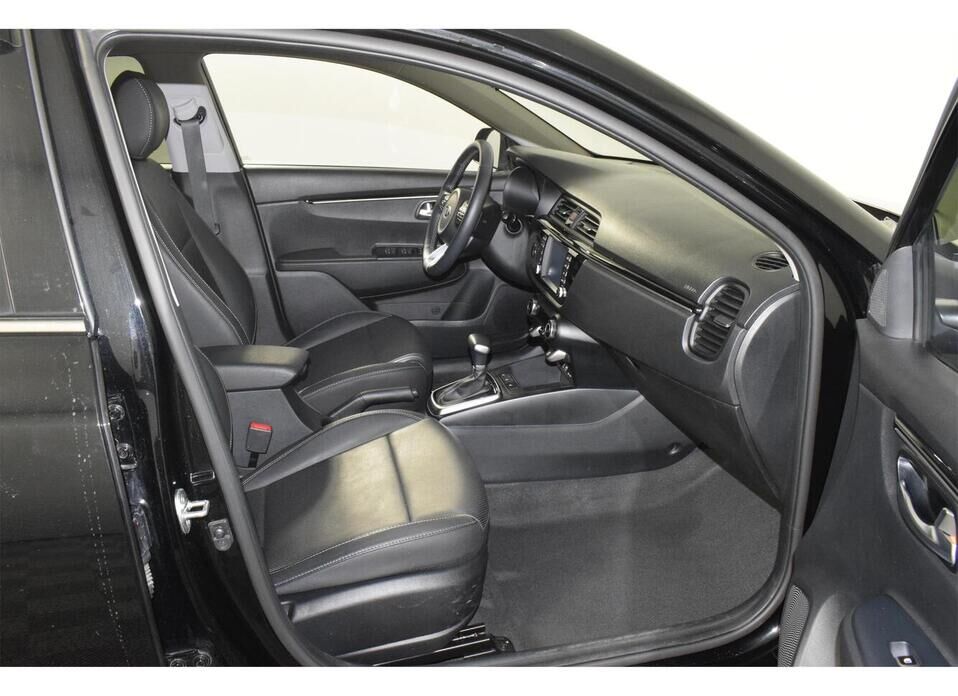 Kia Rio X-Line 1.6 AT (123 л.с.)
