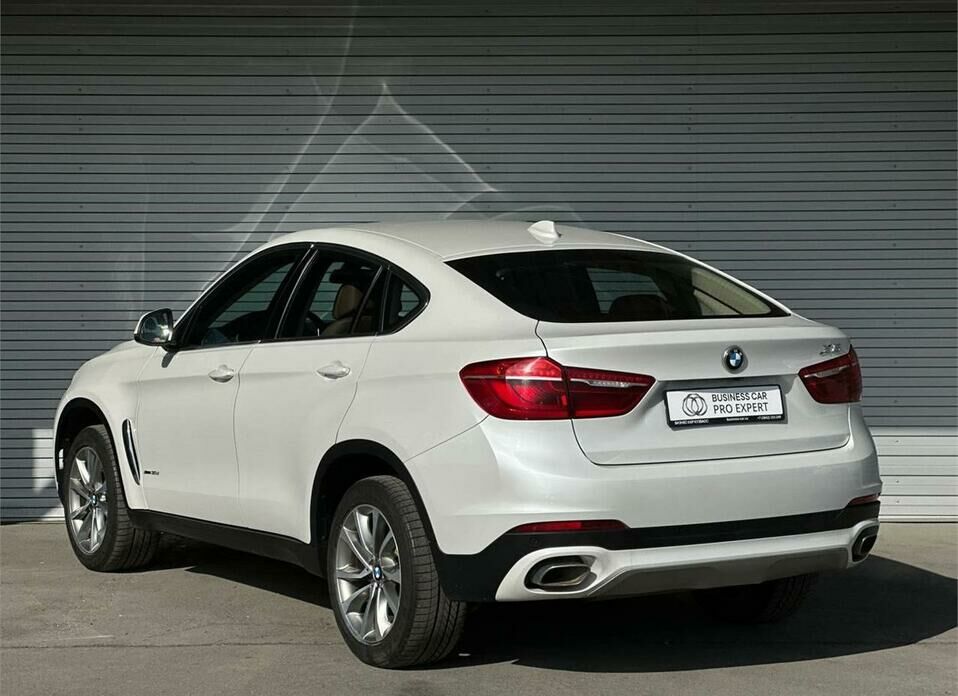 BMW X6 M 4.4 AT (575 л.с.) 4WD