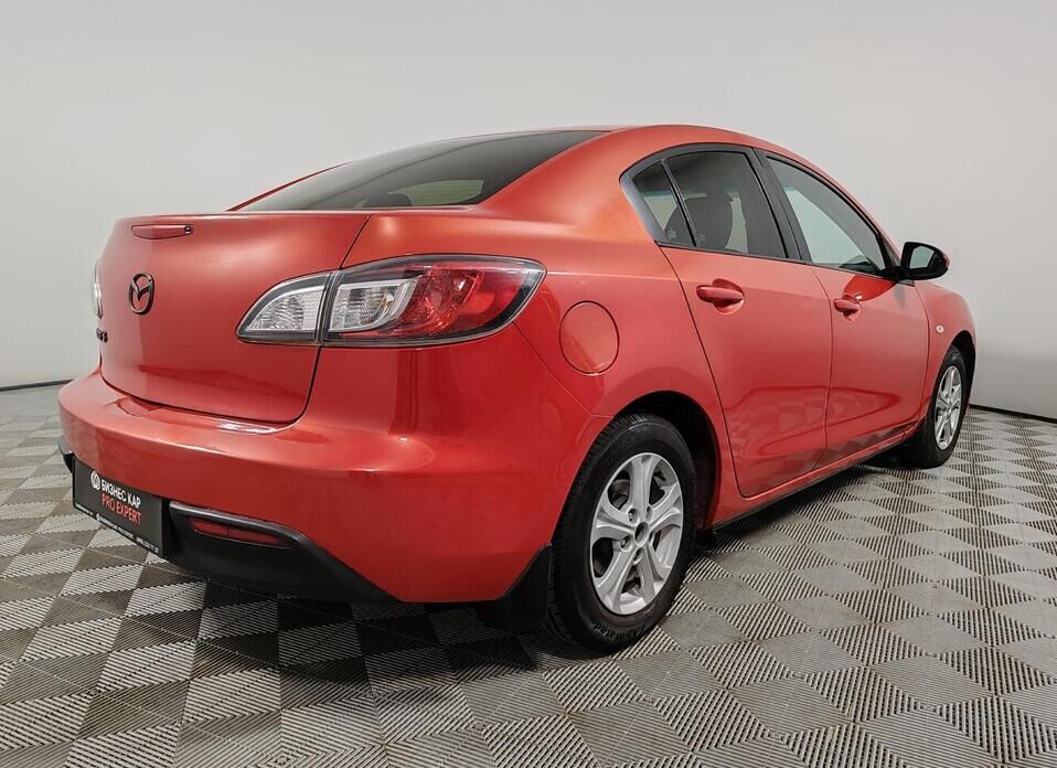 Mazda 3 1.6 AT (105 л.с.)