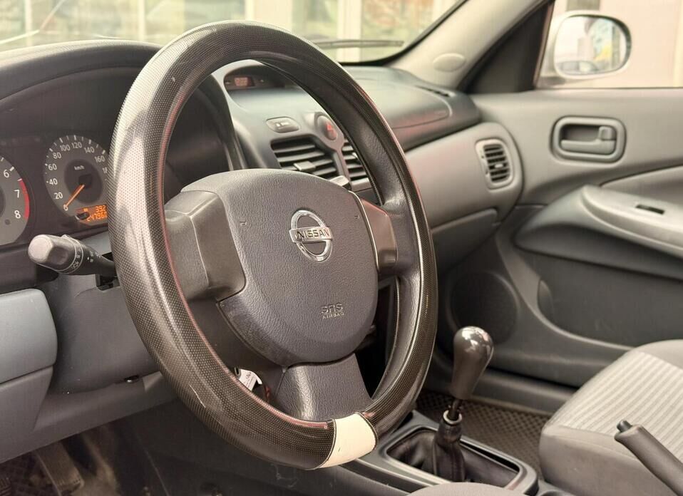 Nissan Almera Classic, I 1.6 MT (107 л.с.)