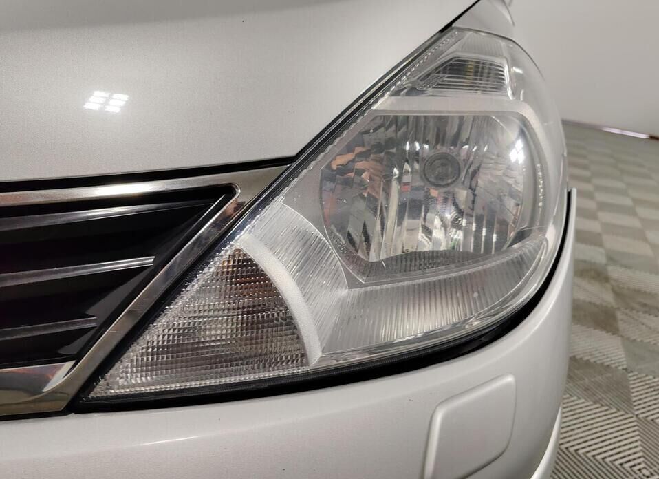 Nissan Tiida 1.6 AT (110 л.с.)