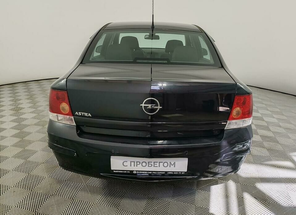 Opel Astra 1.8 AT (140 л.с.)