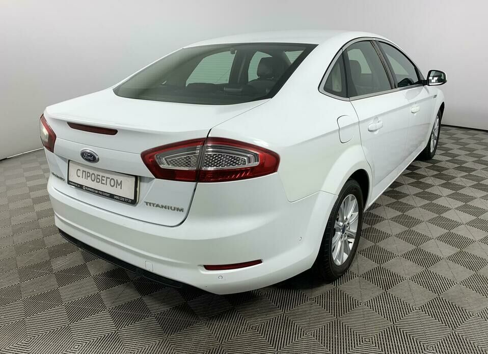 Ford Mondeo 2.0d AT (140 л.с.)