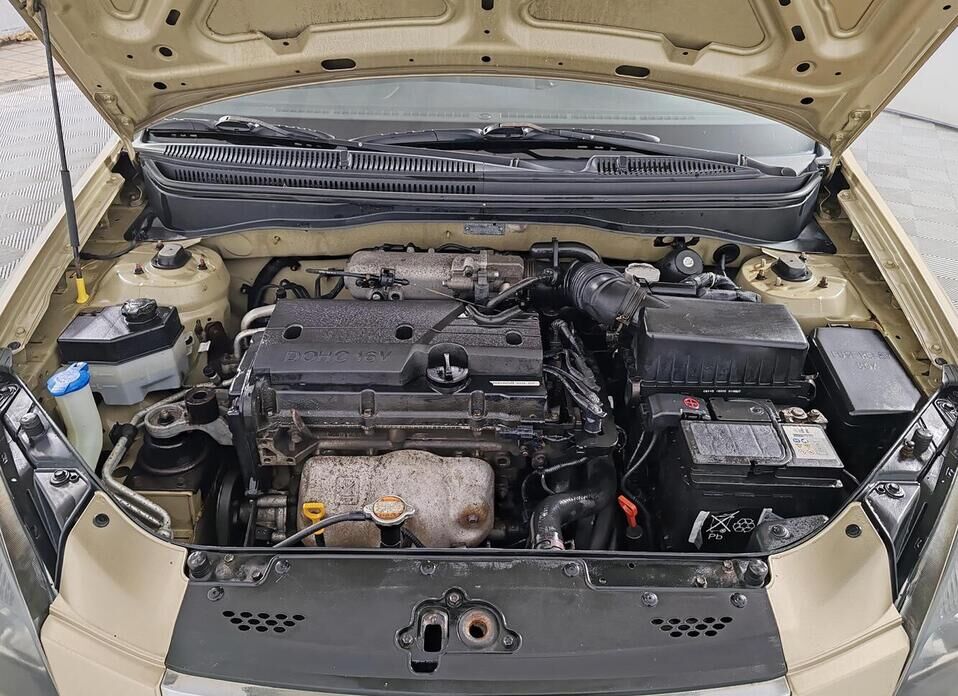 Kia Rio, II Рестайлинг 1.4 AT (95 л.с.)