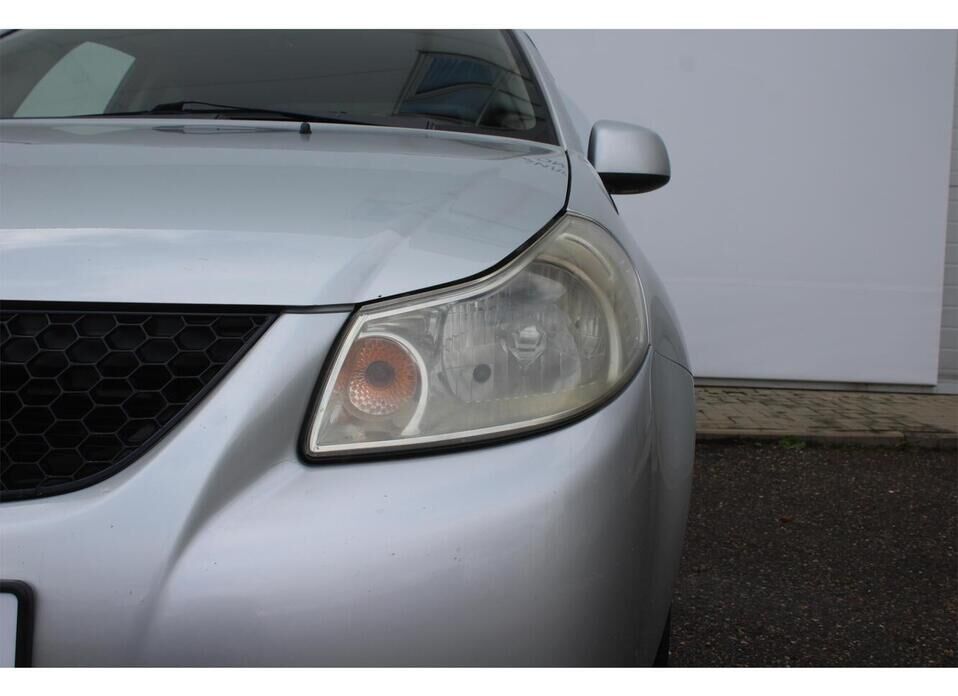 Suzuki SX4, I (Classic) 1.6 AT (106 л.с.)