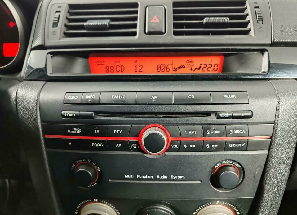 Mazda 3 1.6 AT (105 л.с.)