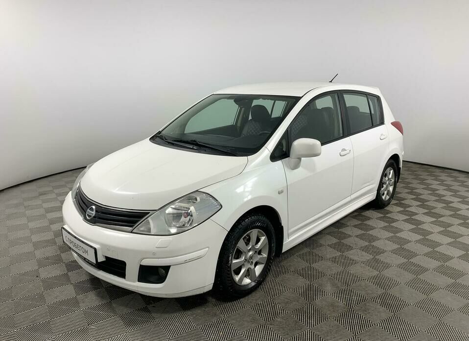 Nissan Tiida 1.6 AT (110 л.с.)