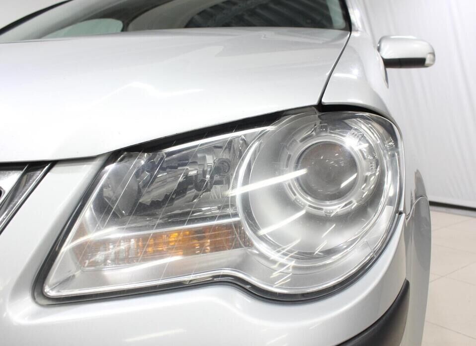 Volkswagen Touran, I Рестайлинг 1.6 MT (102 л.с.)