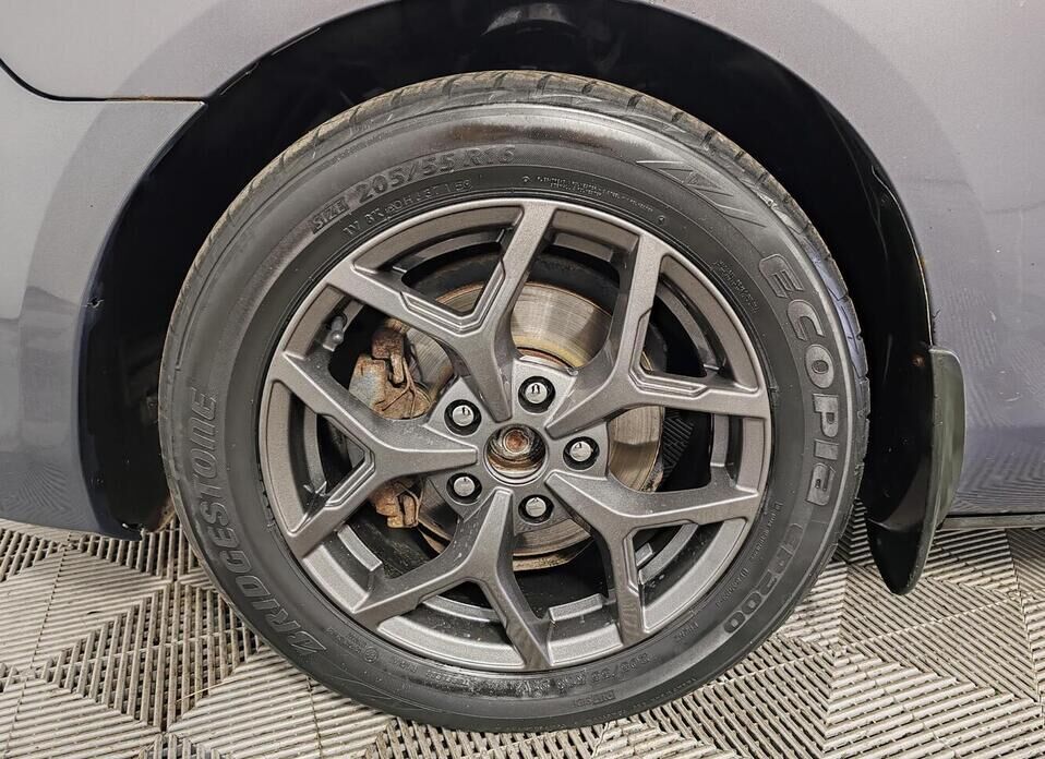 Mazda 3 1.6 AT (105 л.с.)