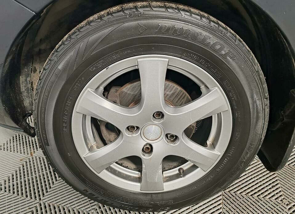 Ford Fusion 1.6 AT (101 л.с.)