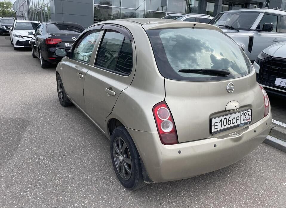 Nissan Micra 1.4 AT (88 л.с.)