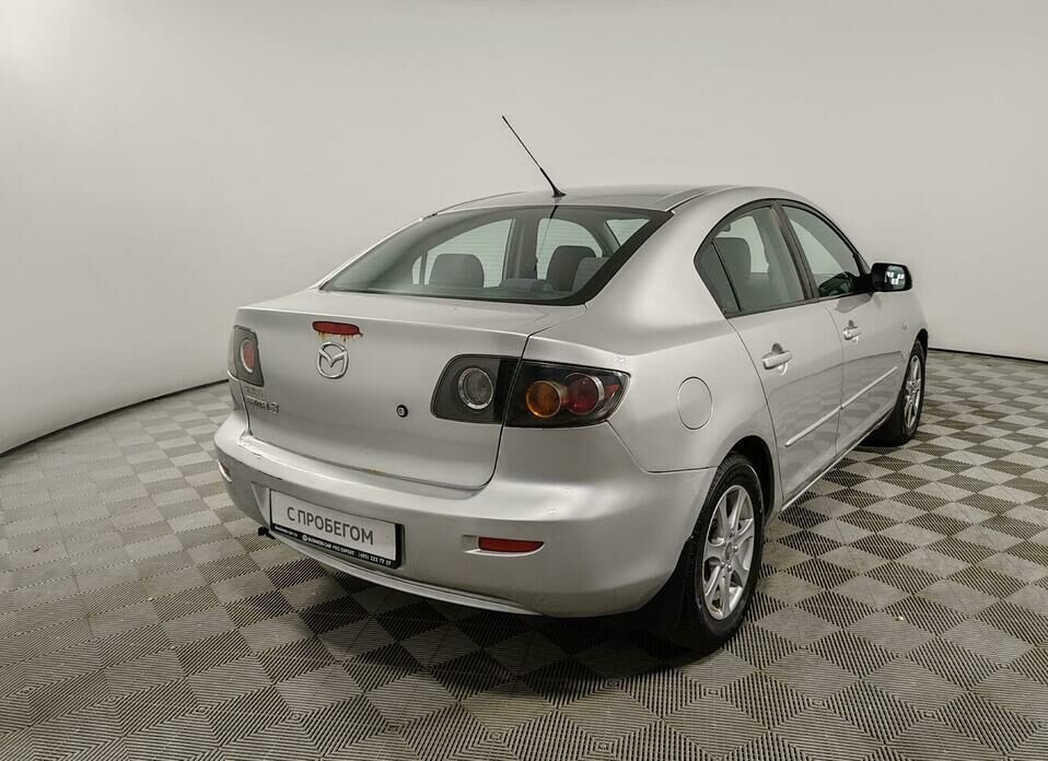 Mazda 3 1.6 AT (105 л.с.)
