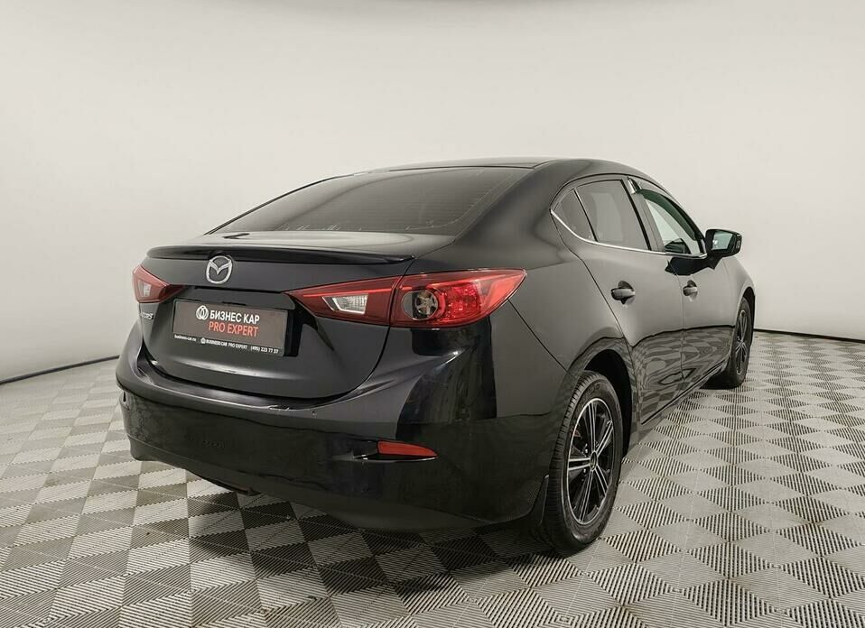 Mazda 3 1.6 AT (104 л.с.)