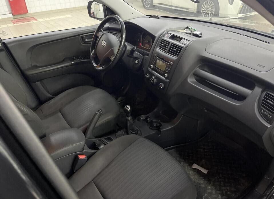 Kia Sportage, II Рестайлинг 2.0 MT (141 л.с.)
