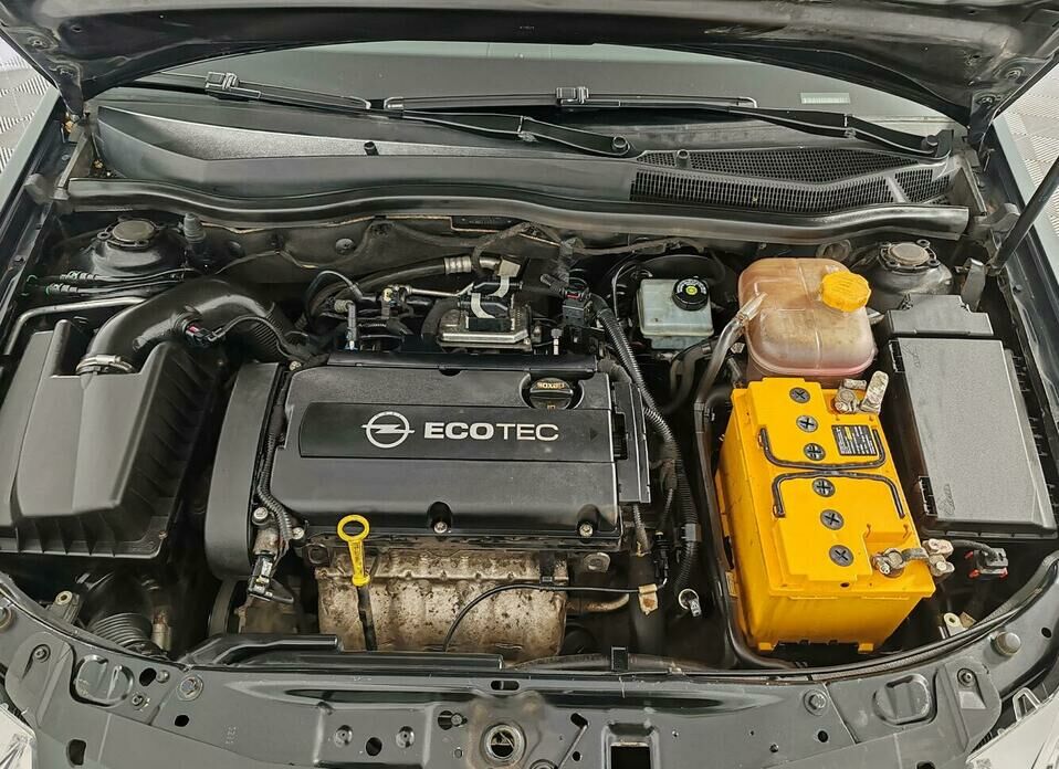 Opel Astra 1.8 AT (140 л.с.)