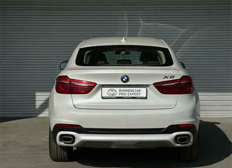 BMW X6 M 4.4 AT (575 л.с.) 4WD