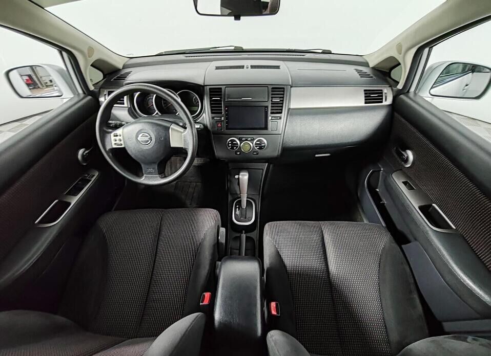 Nissan Tiida 1.6 AT (110 л.с.)