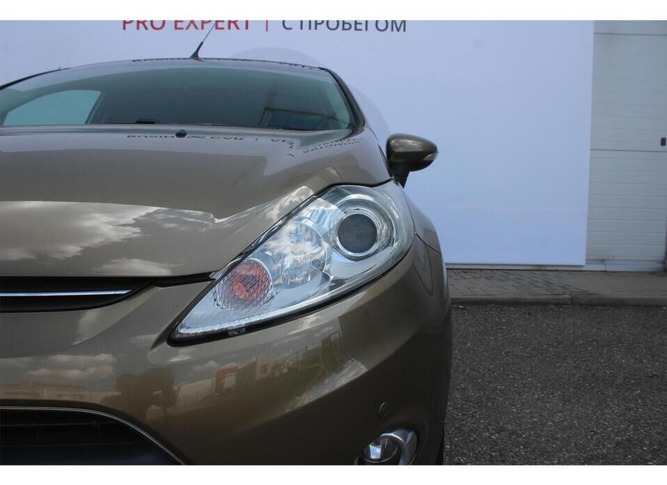 Ford Fiesta 1.4 AT (96 л.с.)
