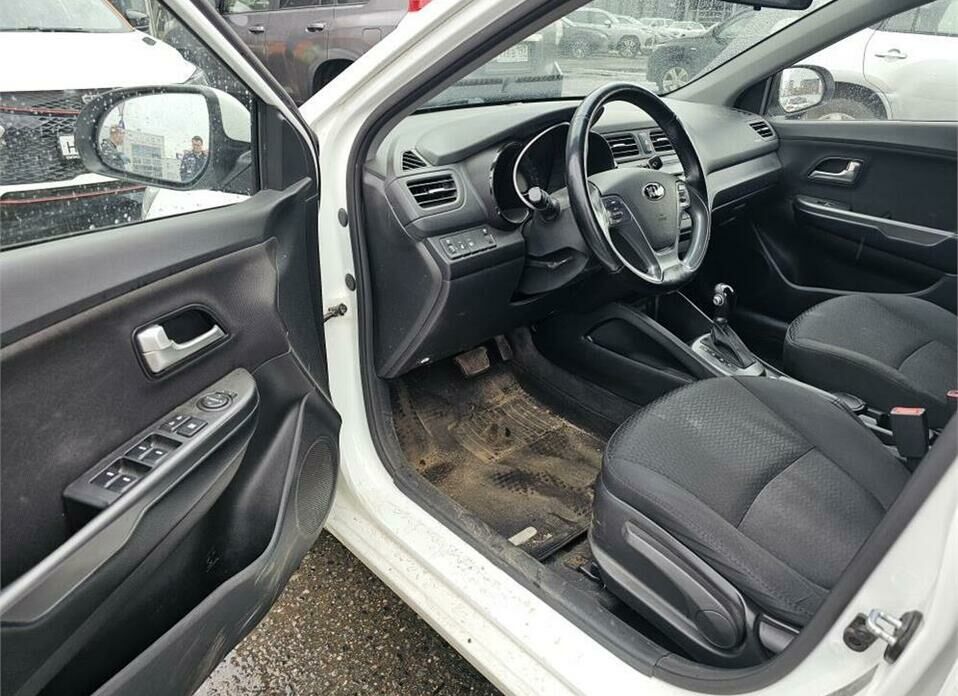 Kia Rio 1.6 AT (123 л.с.)