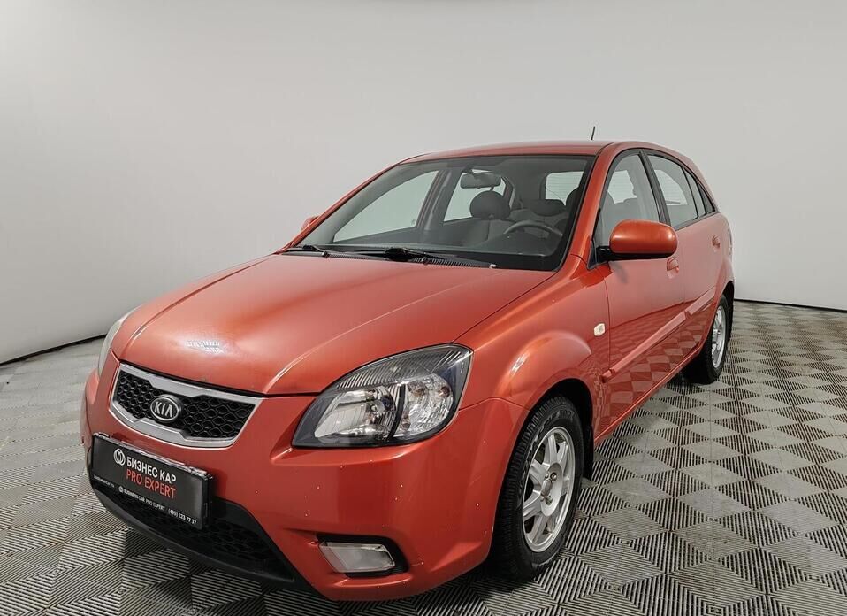 Kia Rio, II Рестайлинг 1.4 AT (95 л.с.)