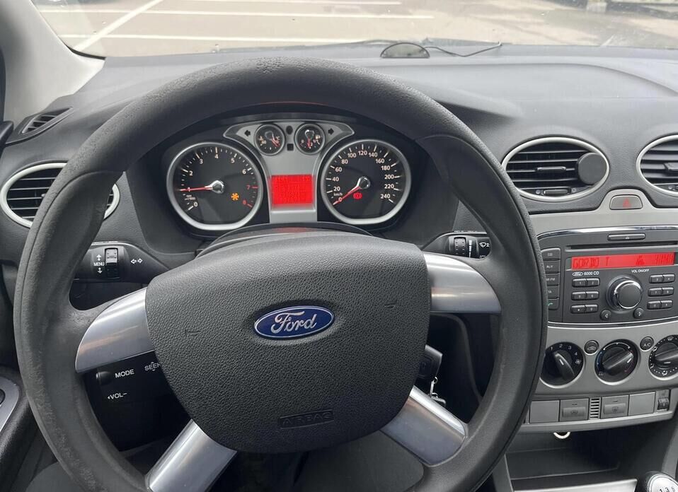 Ford Focus, II Рестайлинг 1.6 MT (100 л.с.)