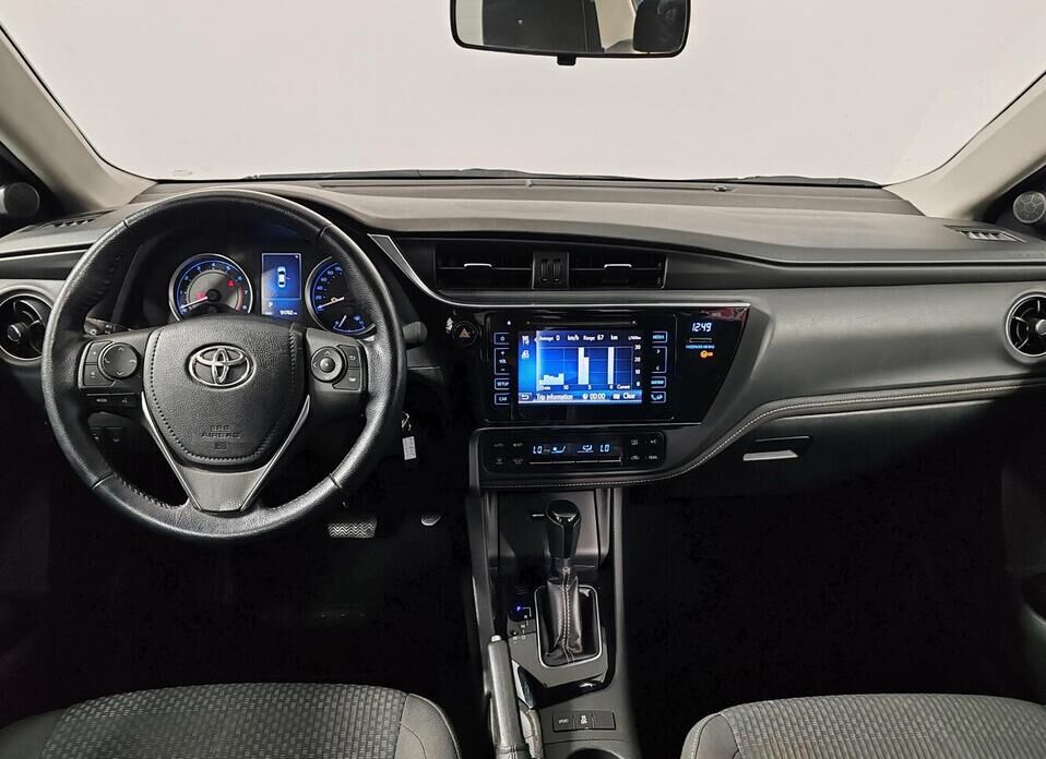 Toyota Corolla, XI (E160, E170) Рестайлинг 1 1.6 CVT (122 л.с.)