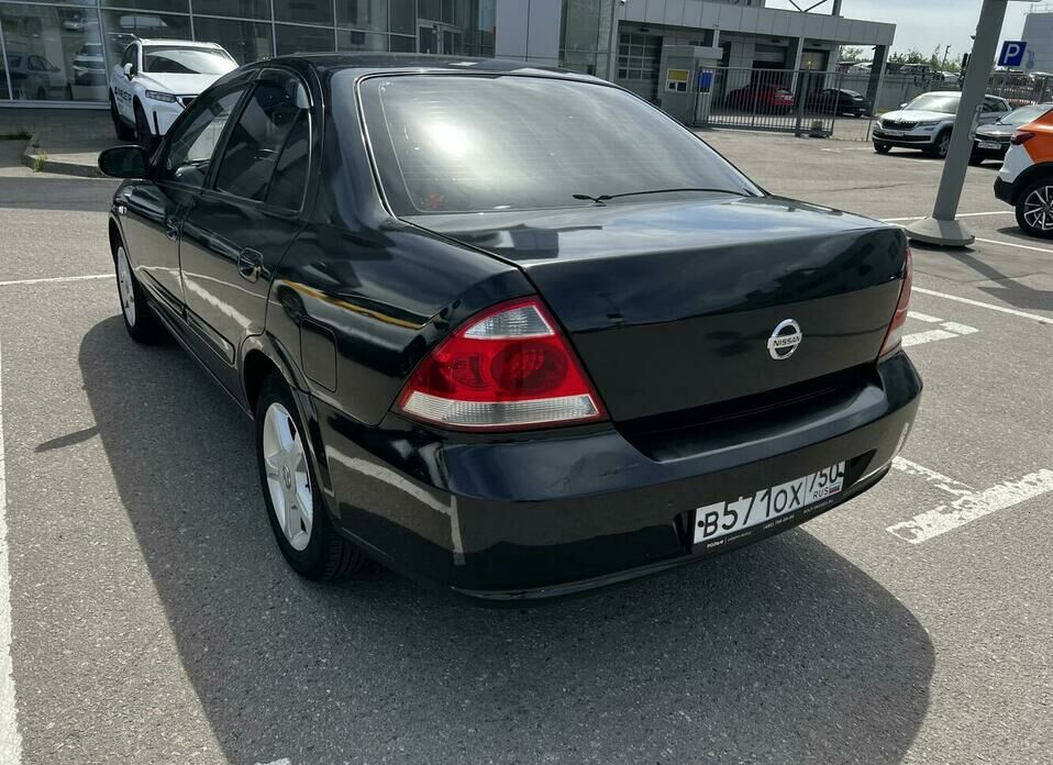 Nissan Almera Classic 1.6 AT (107 л.с.)
