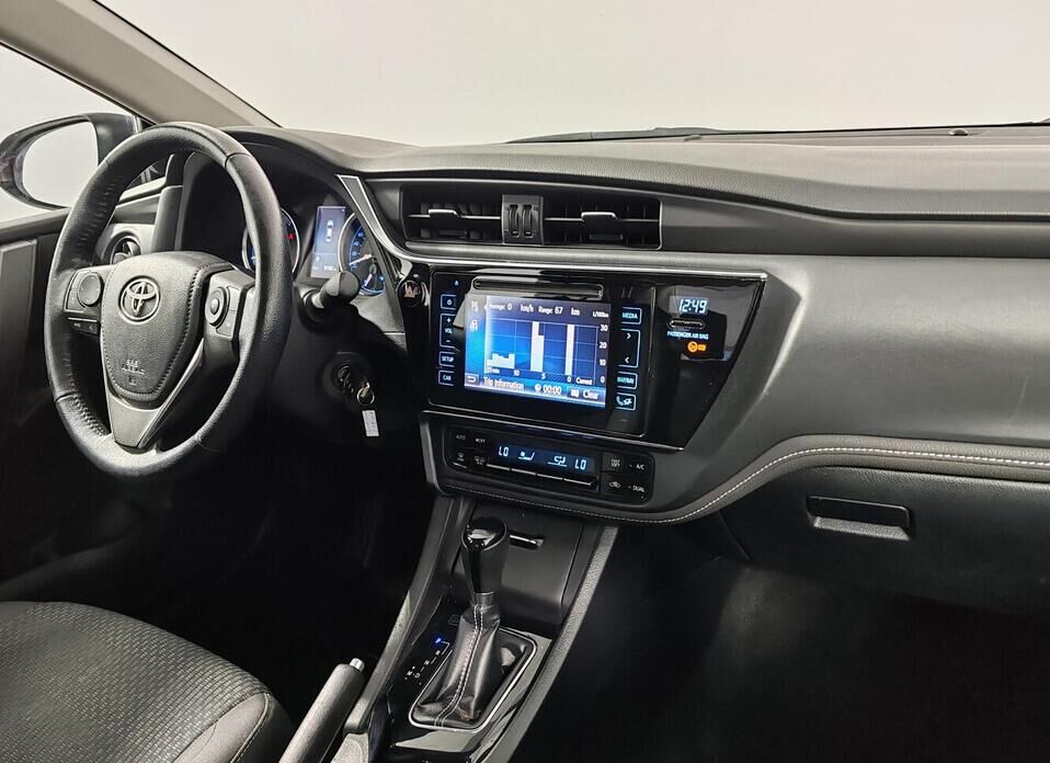 Toyota Corolla, XI (E160, E170) Рестайлинг 1 1.6 CVT (122 л.с.)