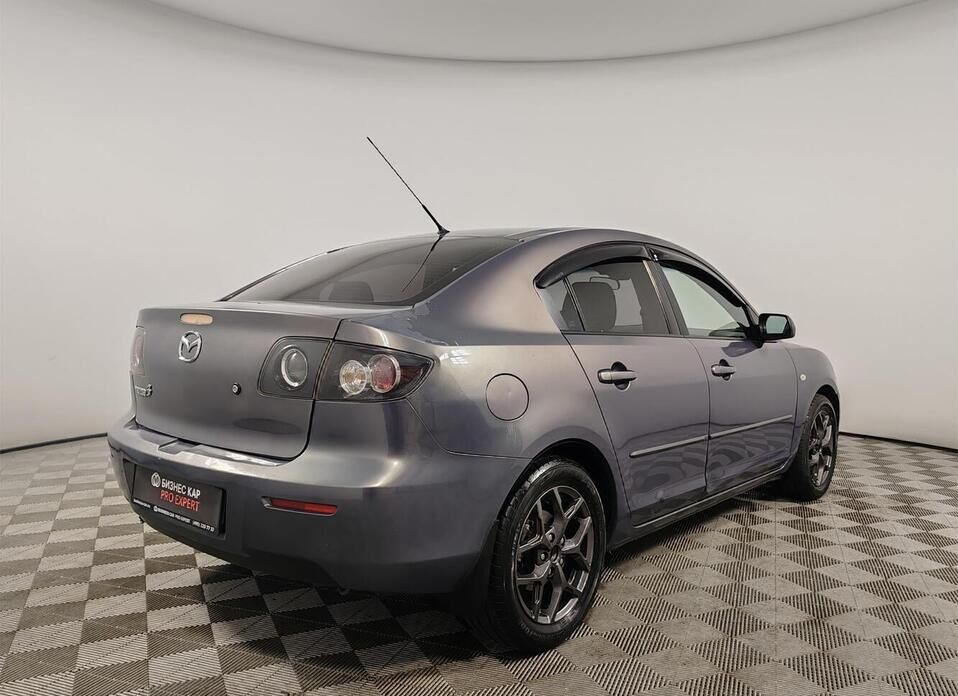 Mazda 3 1.6 AT (105 л.с.)