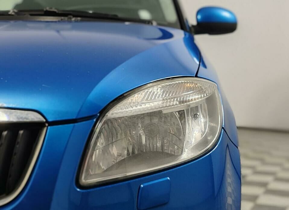 Skoda Roomster 1.6 AT (105 л.с.)